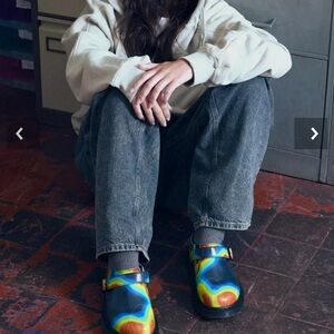 Dr. Martens Vibrant Rainbow Mules
NWOT